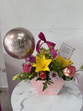 Arreglo floral en carterita elegante