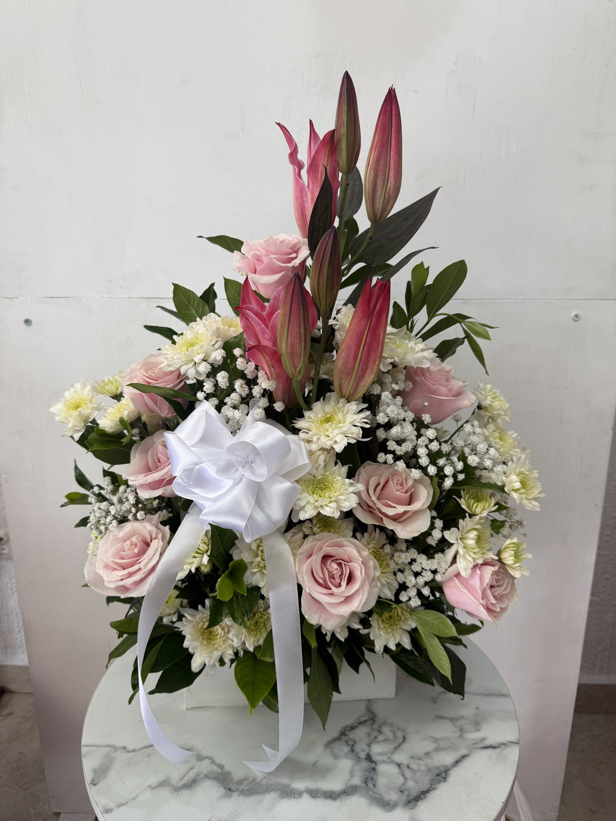 Arreglo floral en base de madera