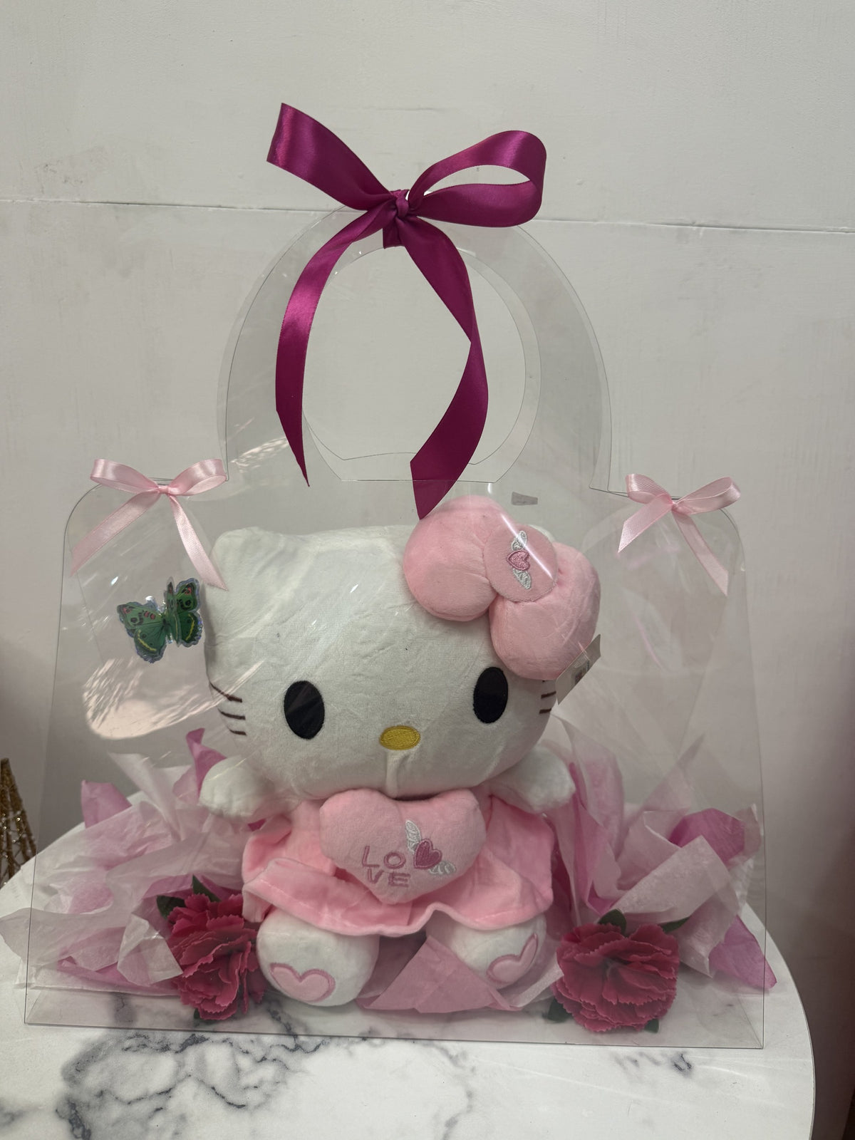 Carterita con Hello Kitty y claveles