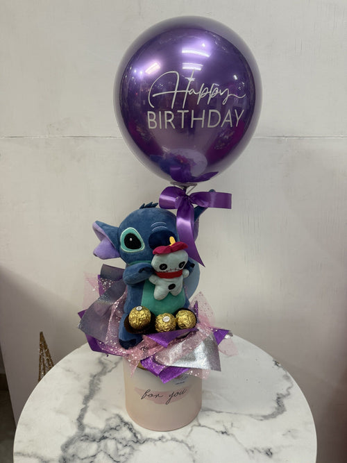 Arreglo con Stitch, chocolates Ferrero y globo